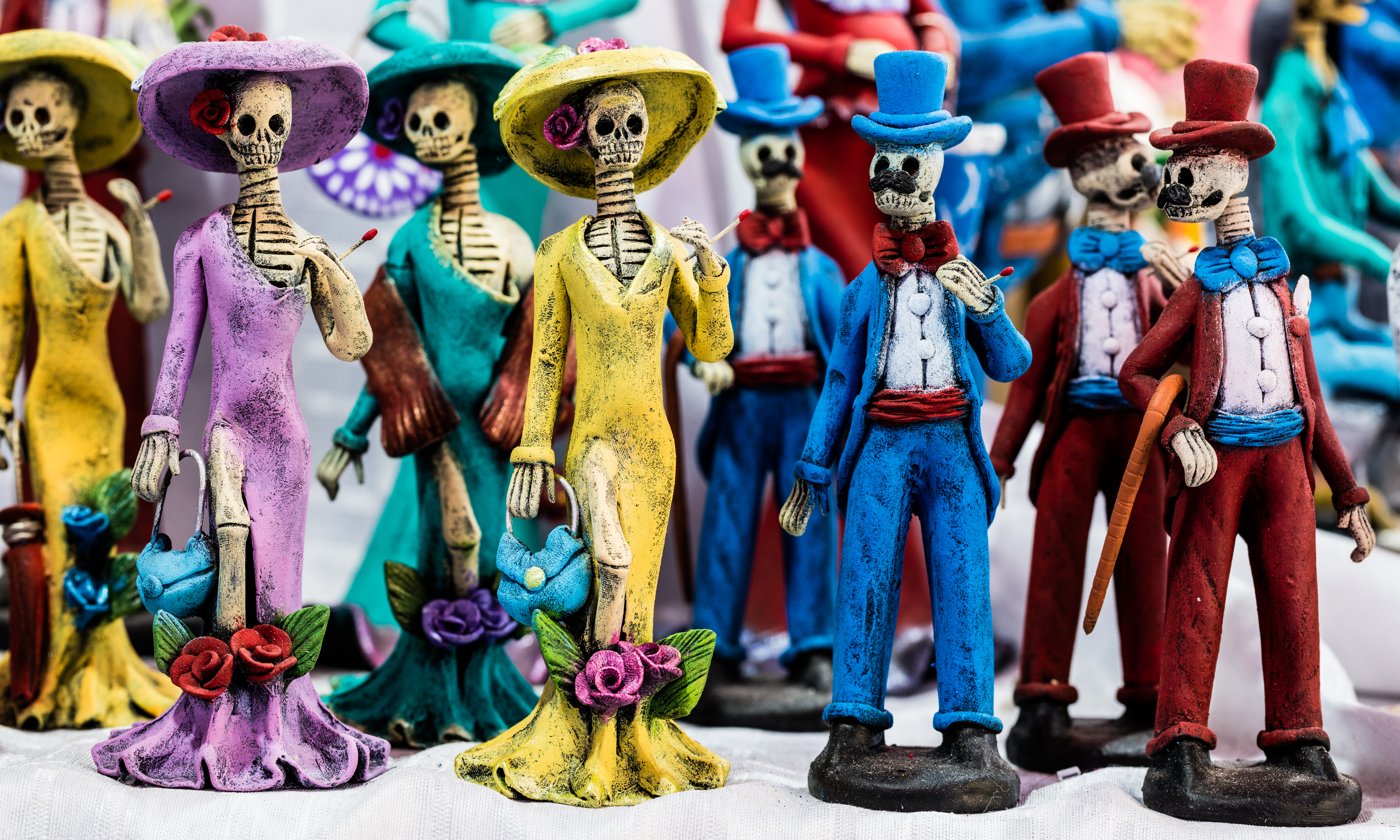 Catrinas are figures in Mexican culture that appear during Day of the Dead celebrations, inspired by the work of José Guadalupe Posada.